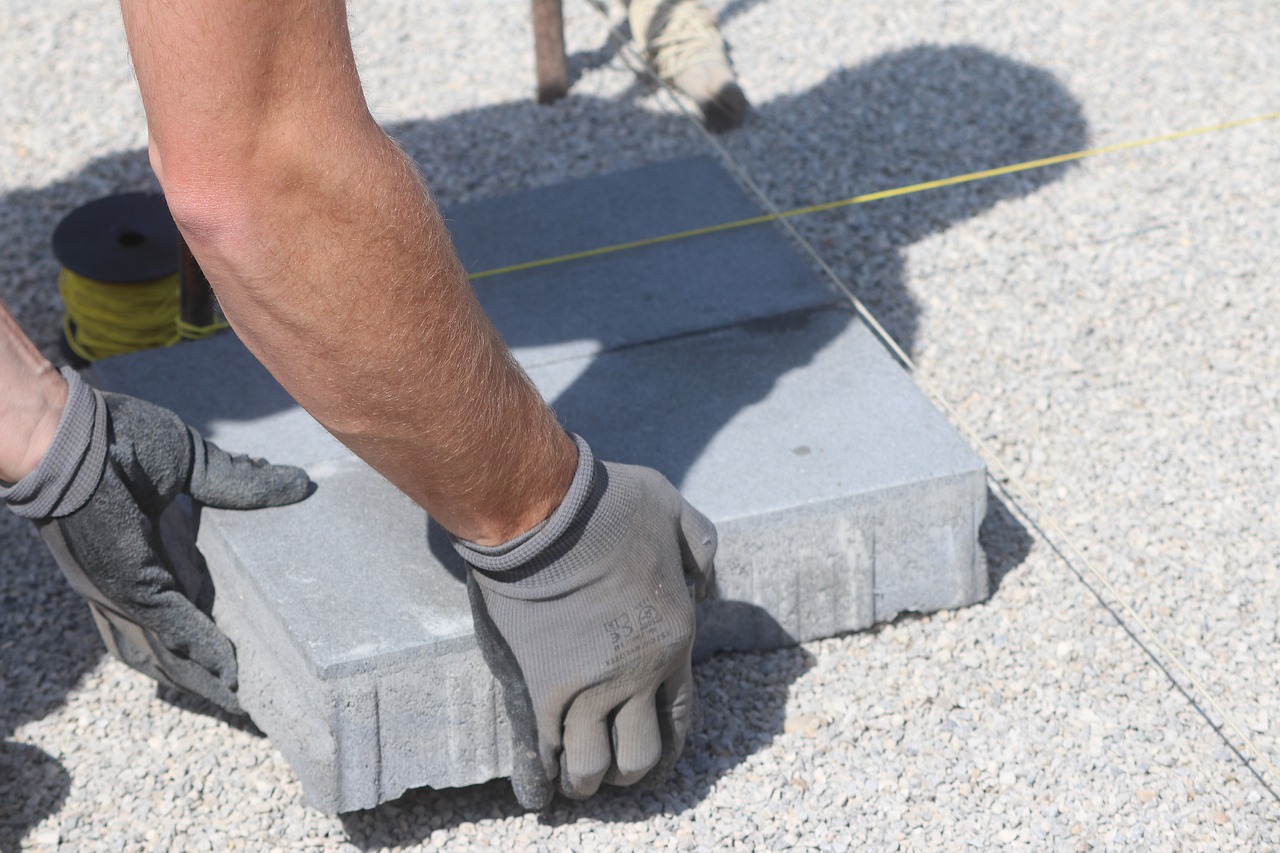 Pflasterstein Auspflastern